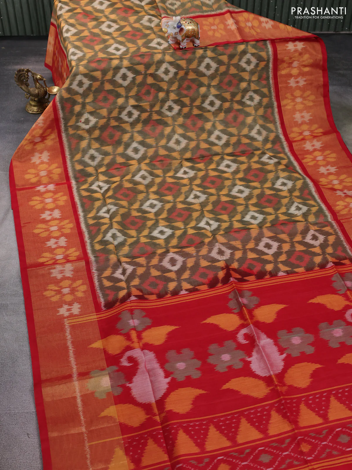 Ikat silk cotton saree chikku shade and red with allover ikat weaves and long zari woven ikat border - Image 2