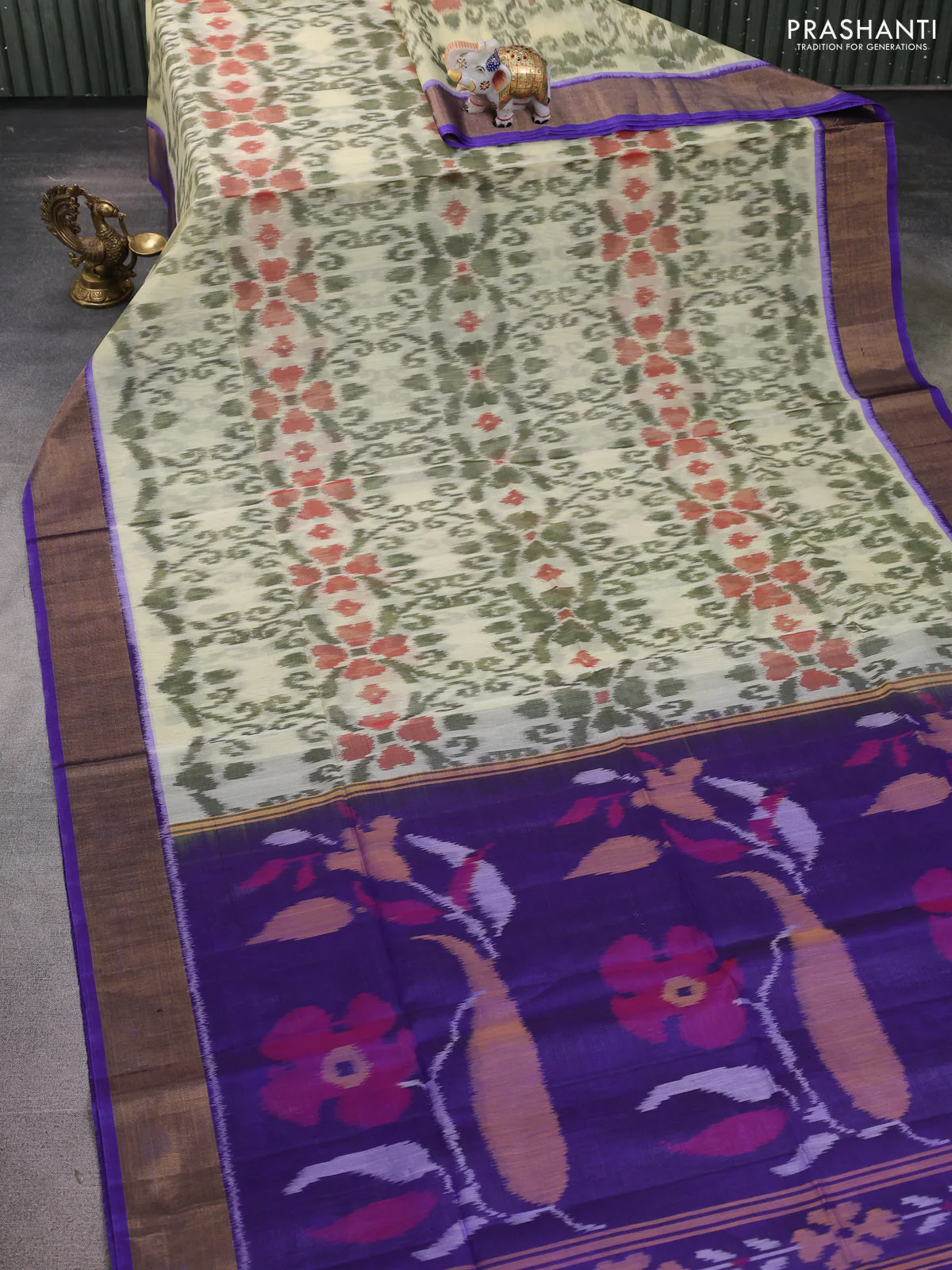 Ikat silk cotton saree cream and blue with allover ikat weaves and zari woven border - Image 2