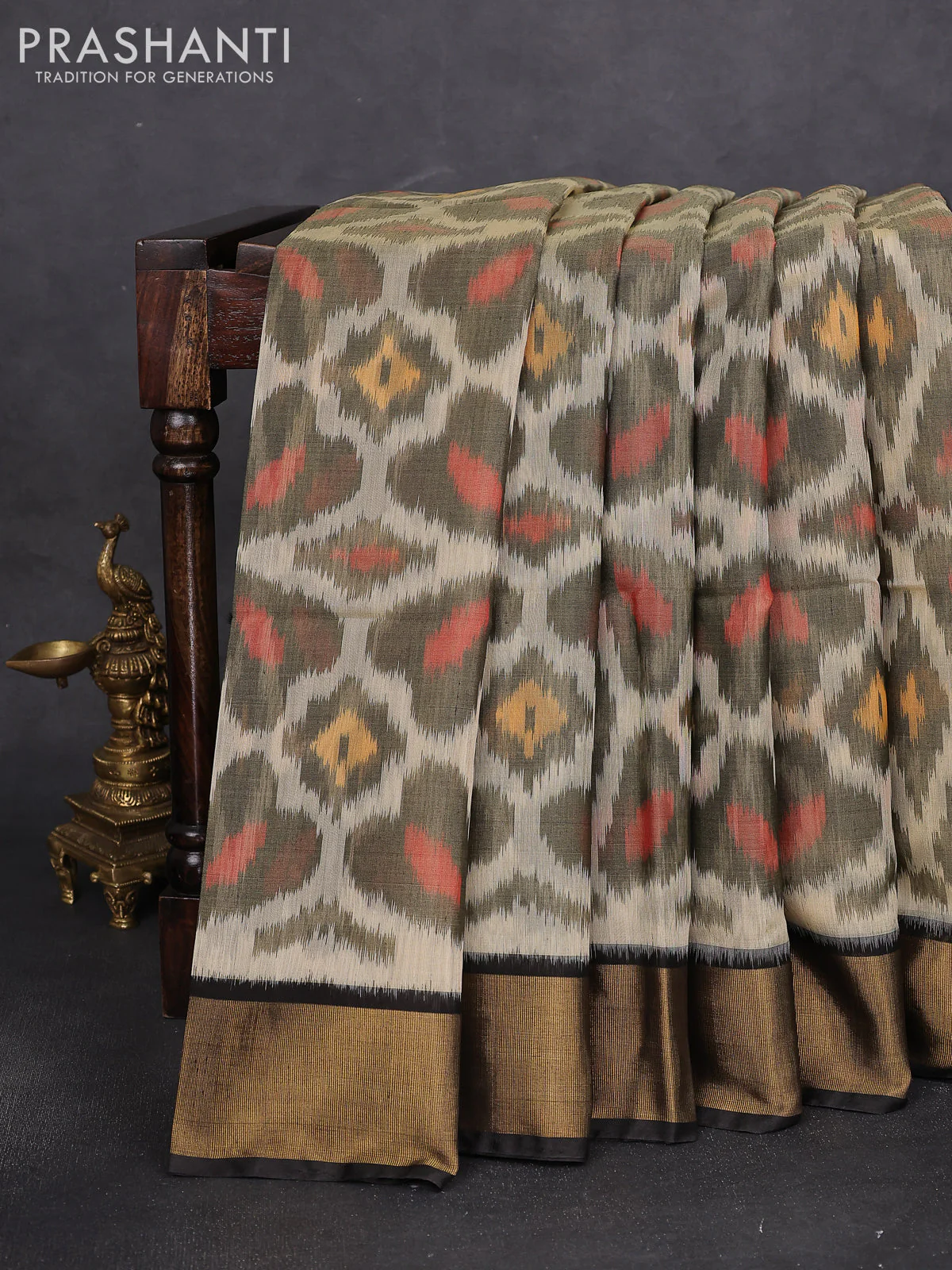 Ikat silk cotton saree cream and deep coffee brown with alover ikat weaves and zari woven border