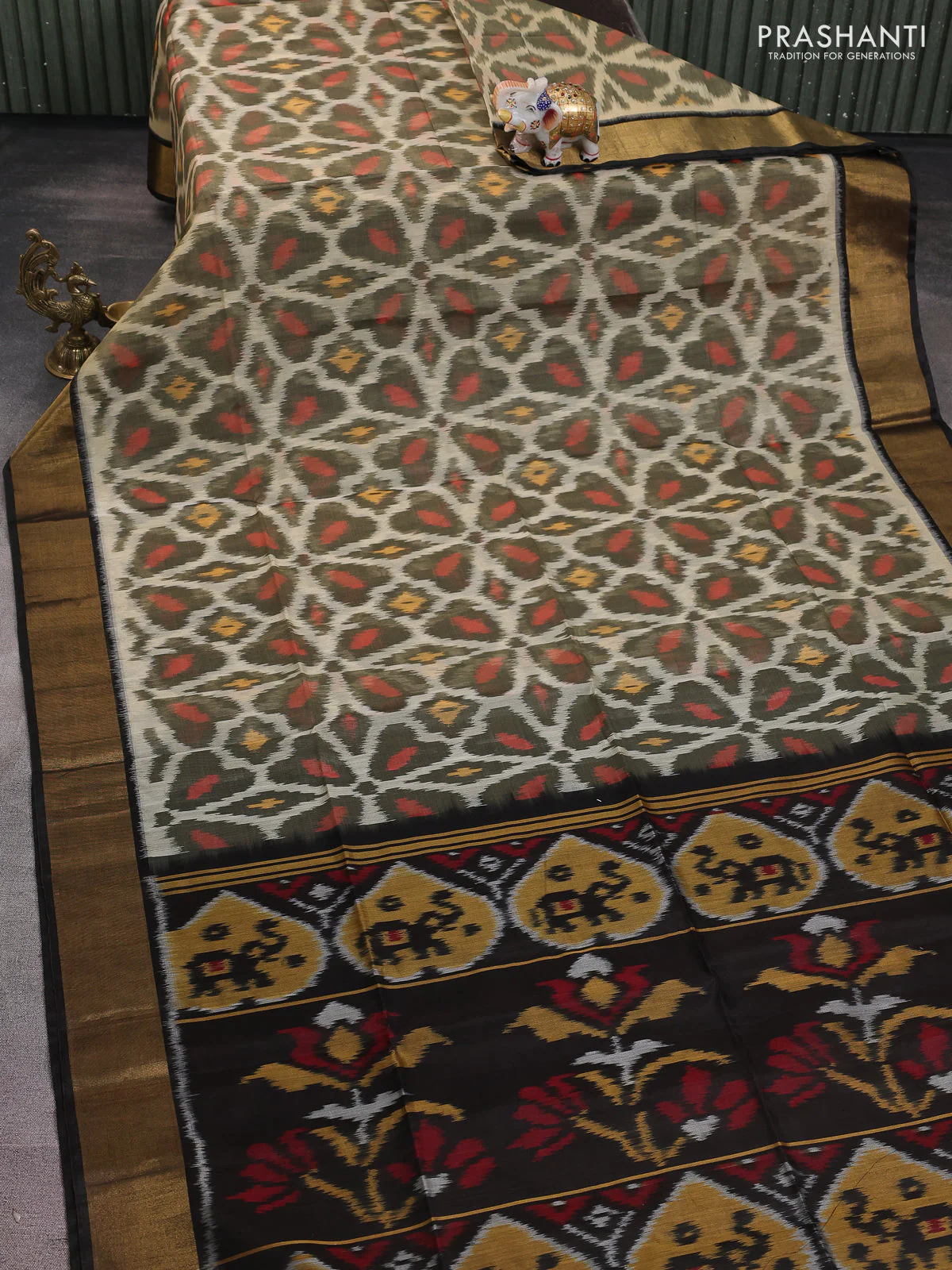 Ikat silk cotton saree cream and deep coffee brown with alover ikat weaves and zari woven border - Image 2