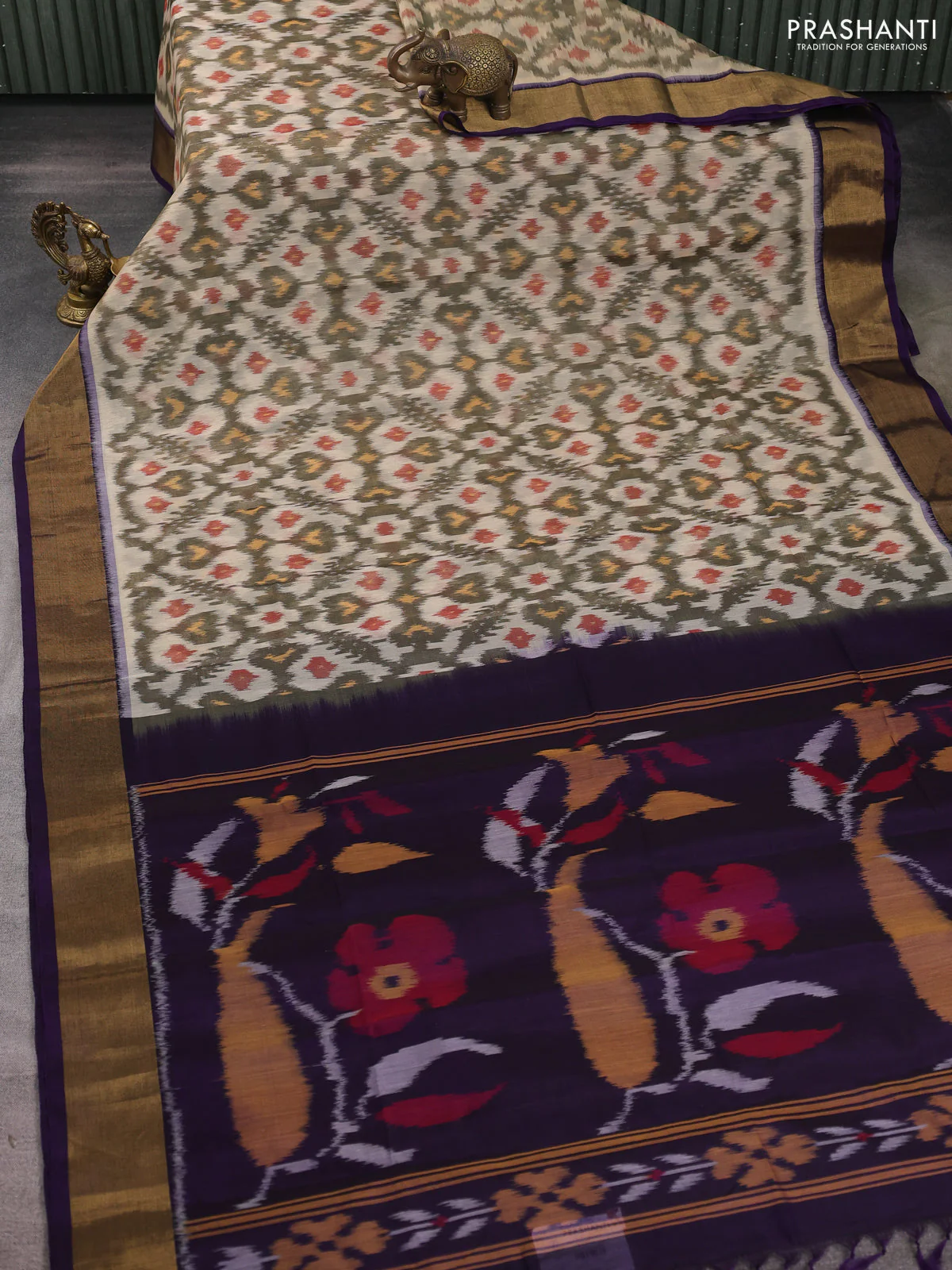 Ikat silk cotton saree cream and deep violet with allover ikat weaves and zari woven border - Image 2