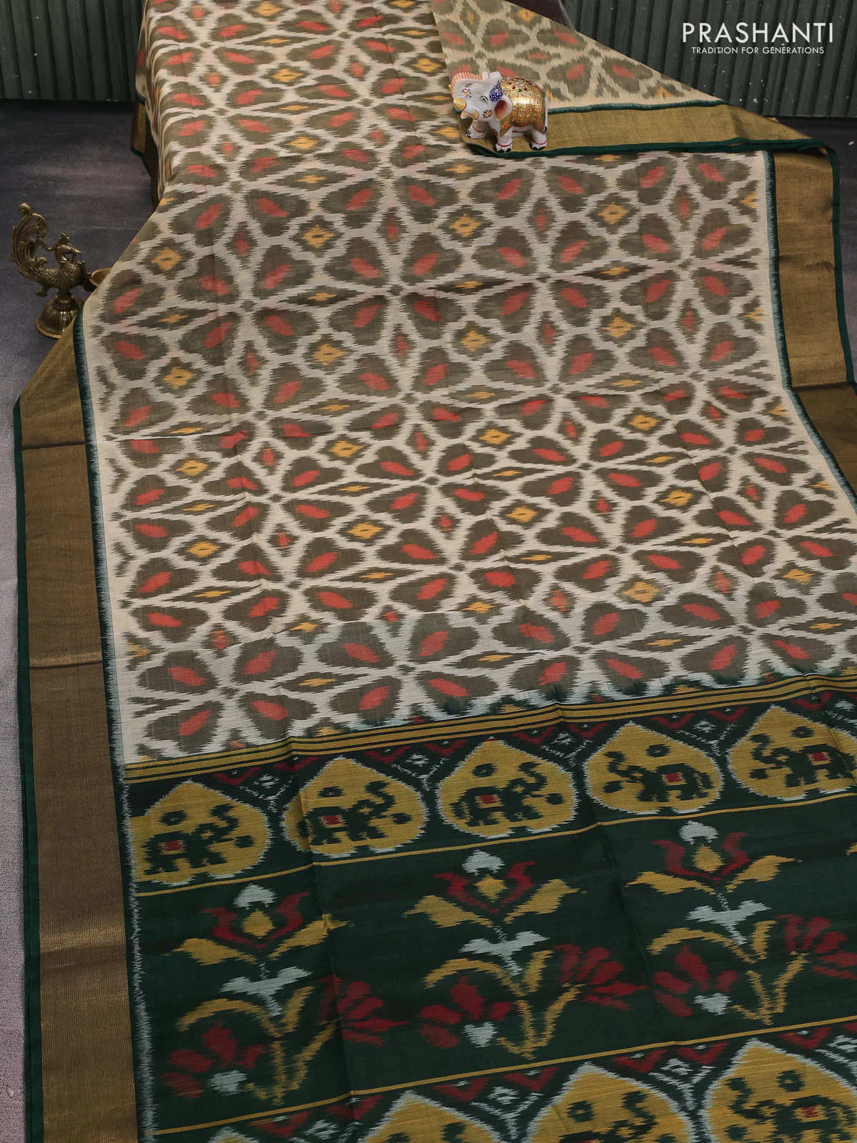 Ikat silk cotton saree cream elaichi green and green with alover ikat weaves and zari woven border - Image 2
