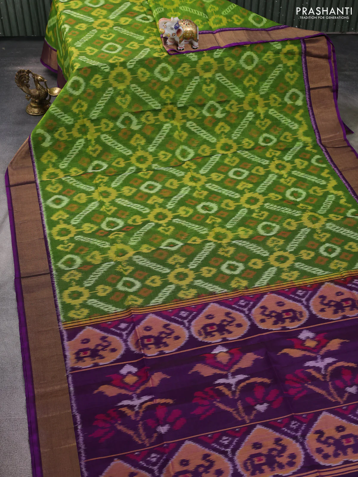 Ikat silk cotton saree green and purple with allover ikat weaves and zari woven border - Image 2