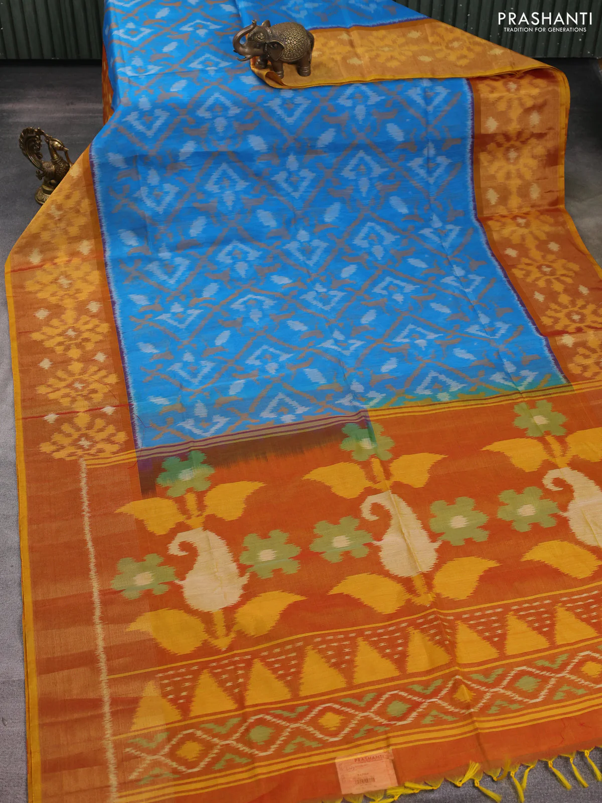 Ikat silk cotton saree light blue and dark mustard with allover ikat weaves and long zari woven ikat border - Image 2
