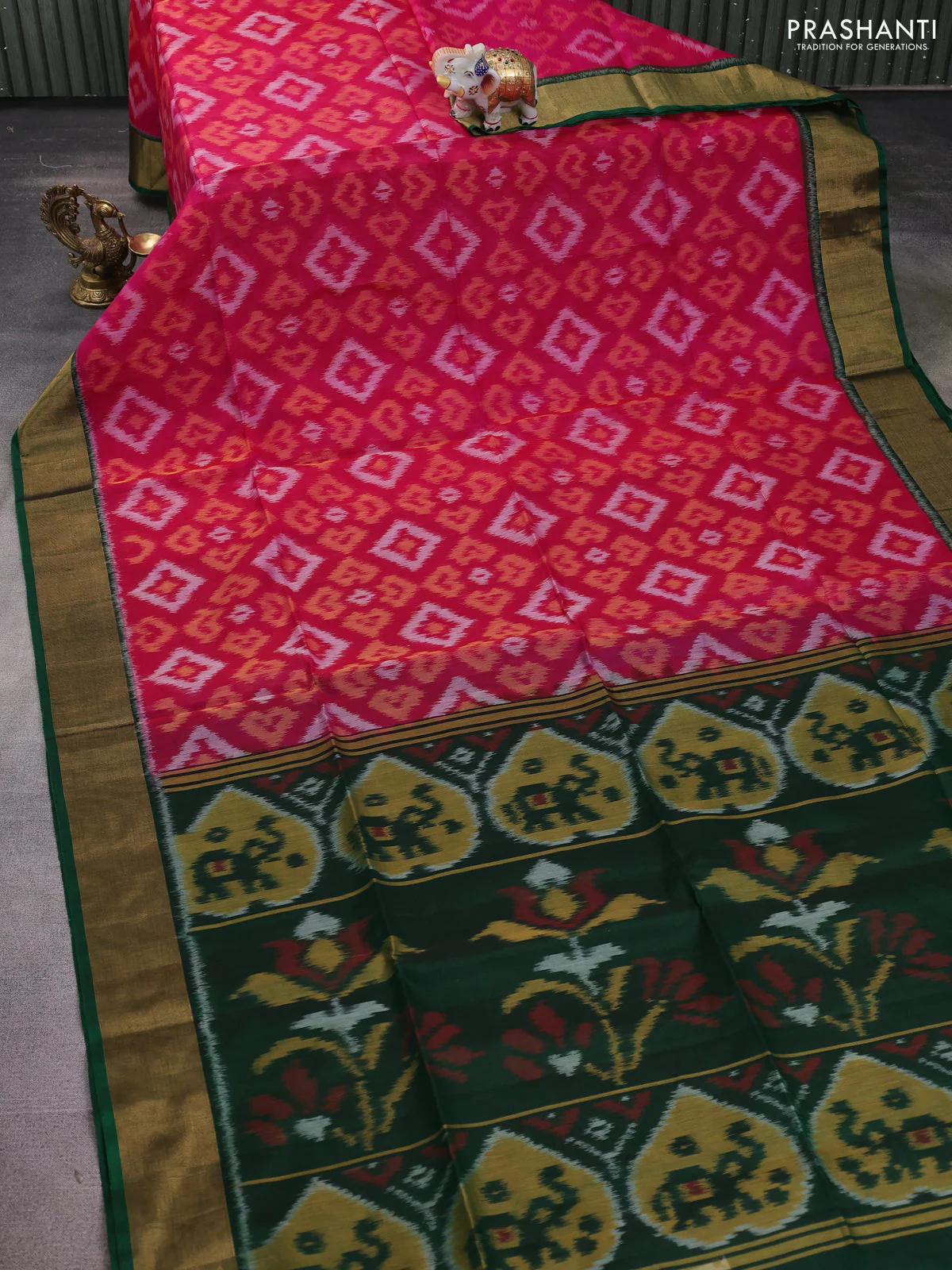 Ikat silk cotton saree magenta pink and bottle green with allover ikat weaves and zari woven border - Image 2