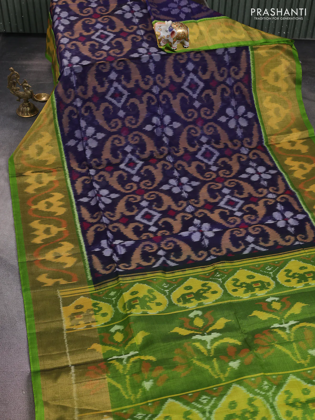 Ikat silk cotton saree navy blue and green with alover ikat weaves and long zari woven ikat border - Image 2