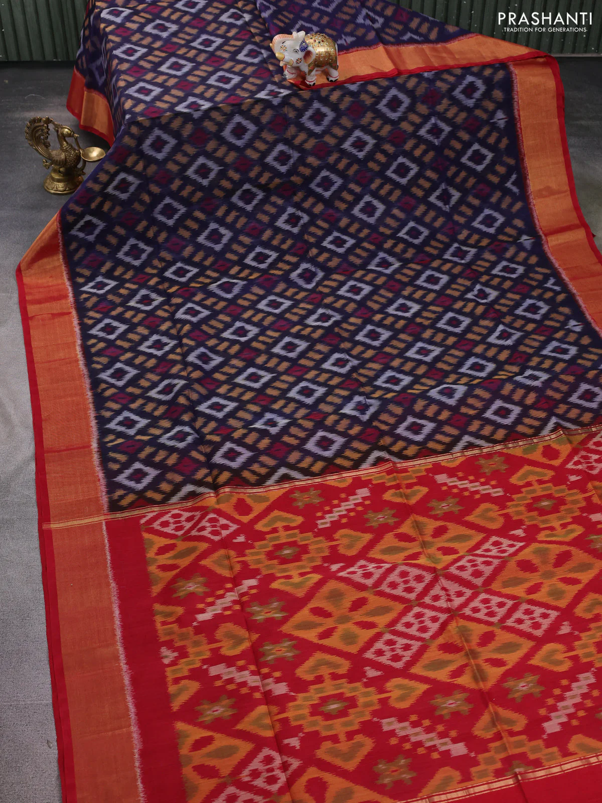 Ikat silk cotton saree navy blue and red with allover ikat weaves and zari woven border - Image 2