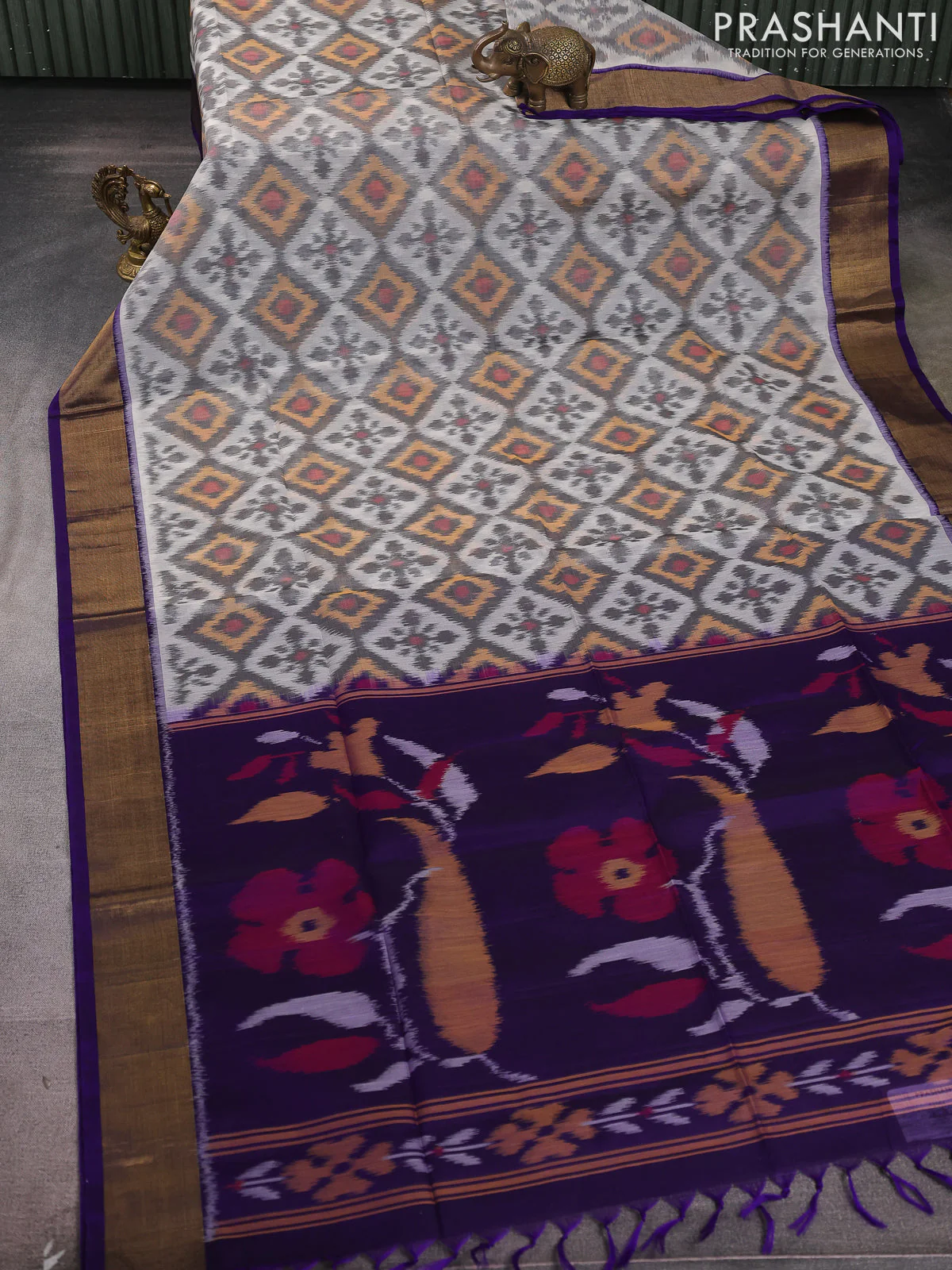 Ikat silk cotton saree off white grey and blue with allover ikat weaves and zari woven border - Image 2