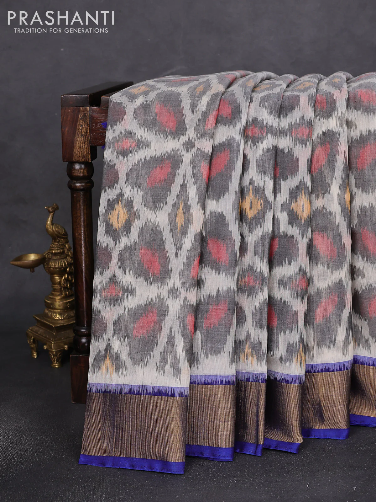 Ikat silk cotton saree off white grey and blue with alover ikat weaves and zari woven border