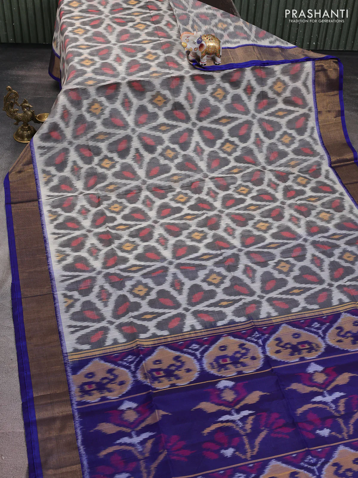 Ikat silk cotton saree off white grey and blue with alover ikat weaves and zari woven border - Image 2