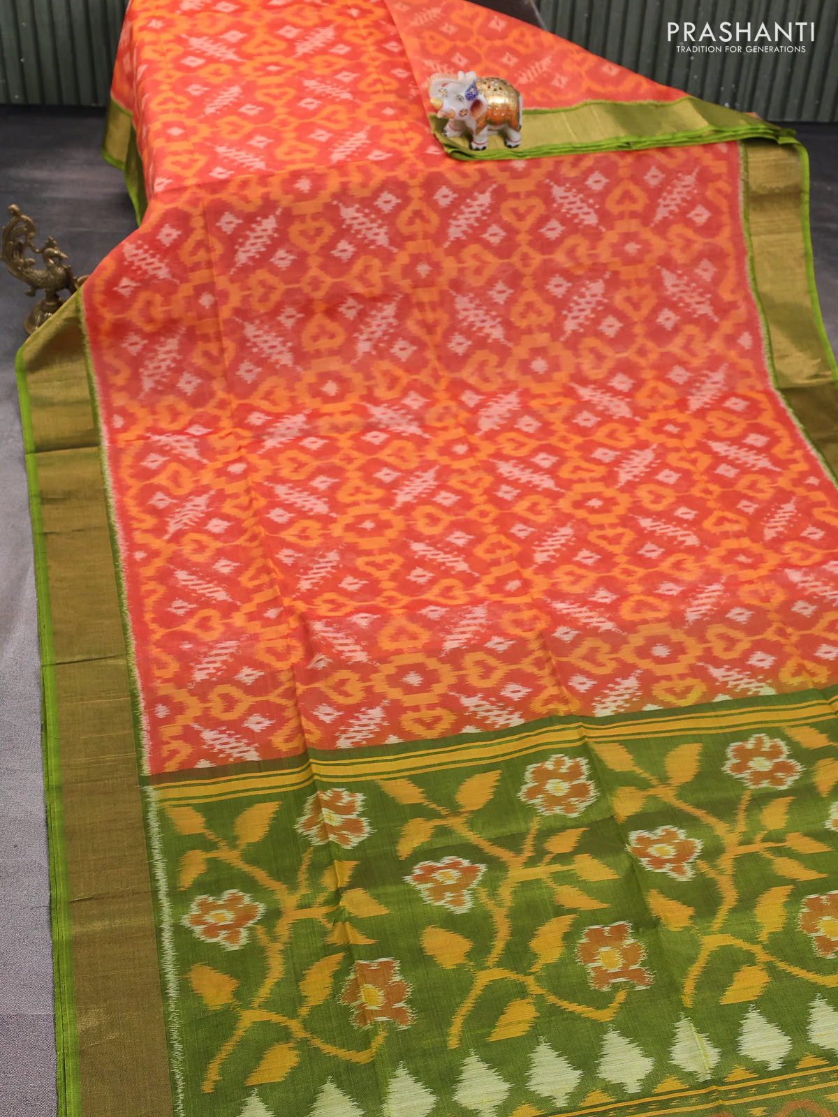 Ikat silk cotton saree orange and light green with alover ikat weaves and zari woven border - Image 2