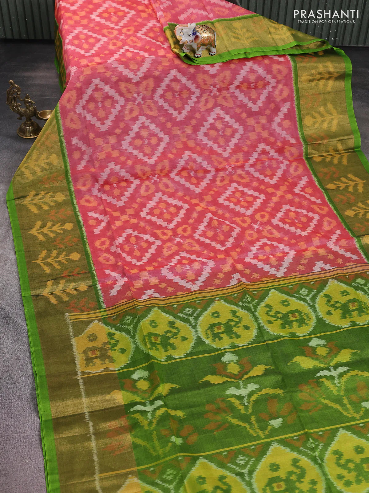 Ikat silk cotton saree peach red and light green with alover ikat weaves and long zari woven ikat border - Image 2