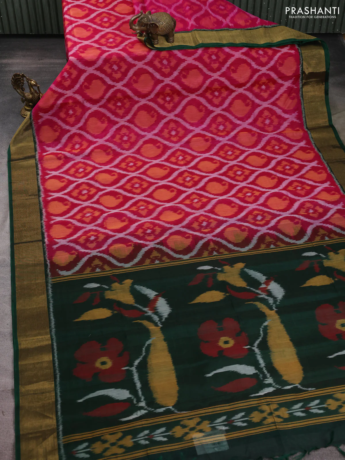 Ikat silk cotton saree pink and bottle green with allover ikat weaves and zari woven border - Image 2