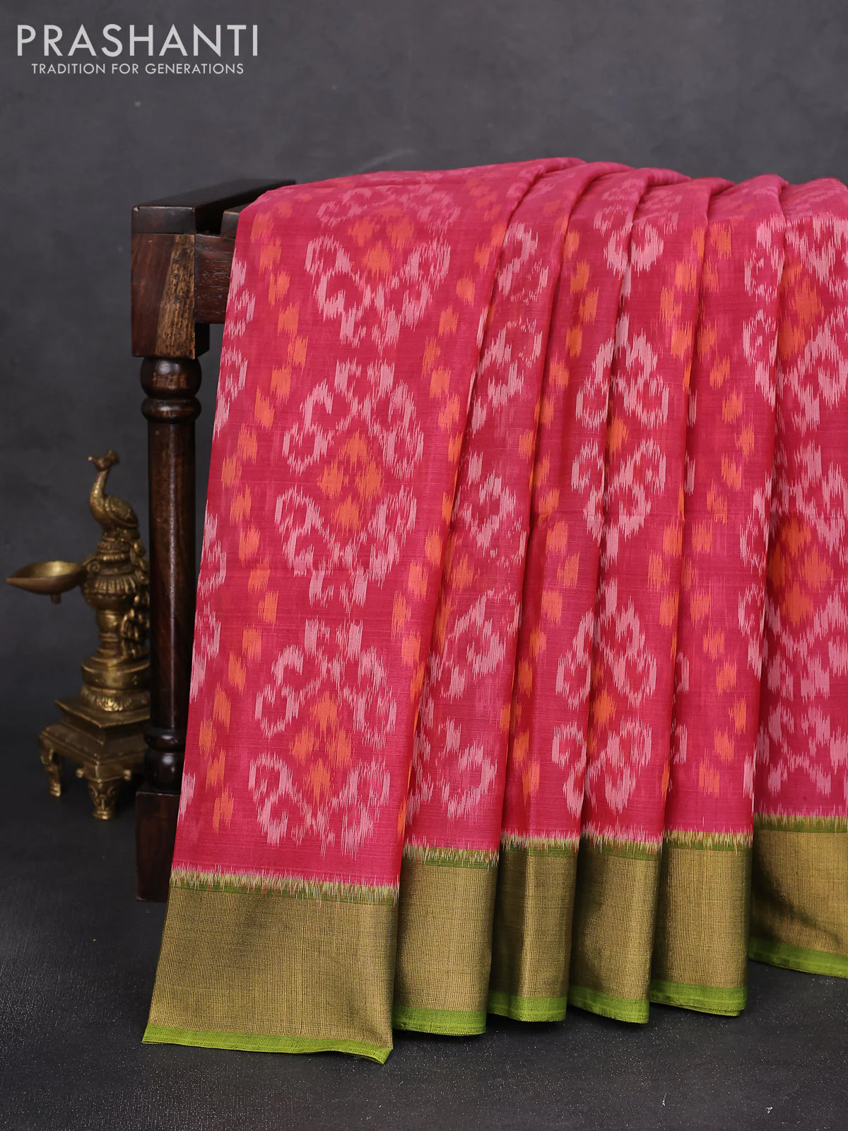 Ikat silk cotton saree pink and light green with alover ikat weaves and zari woven border