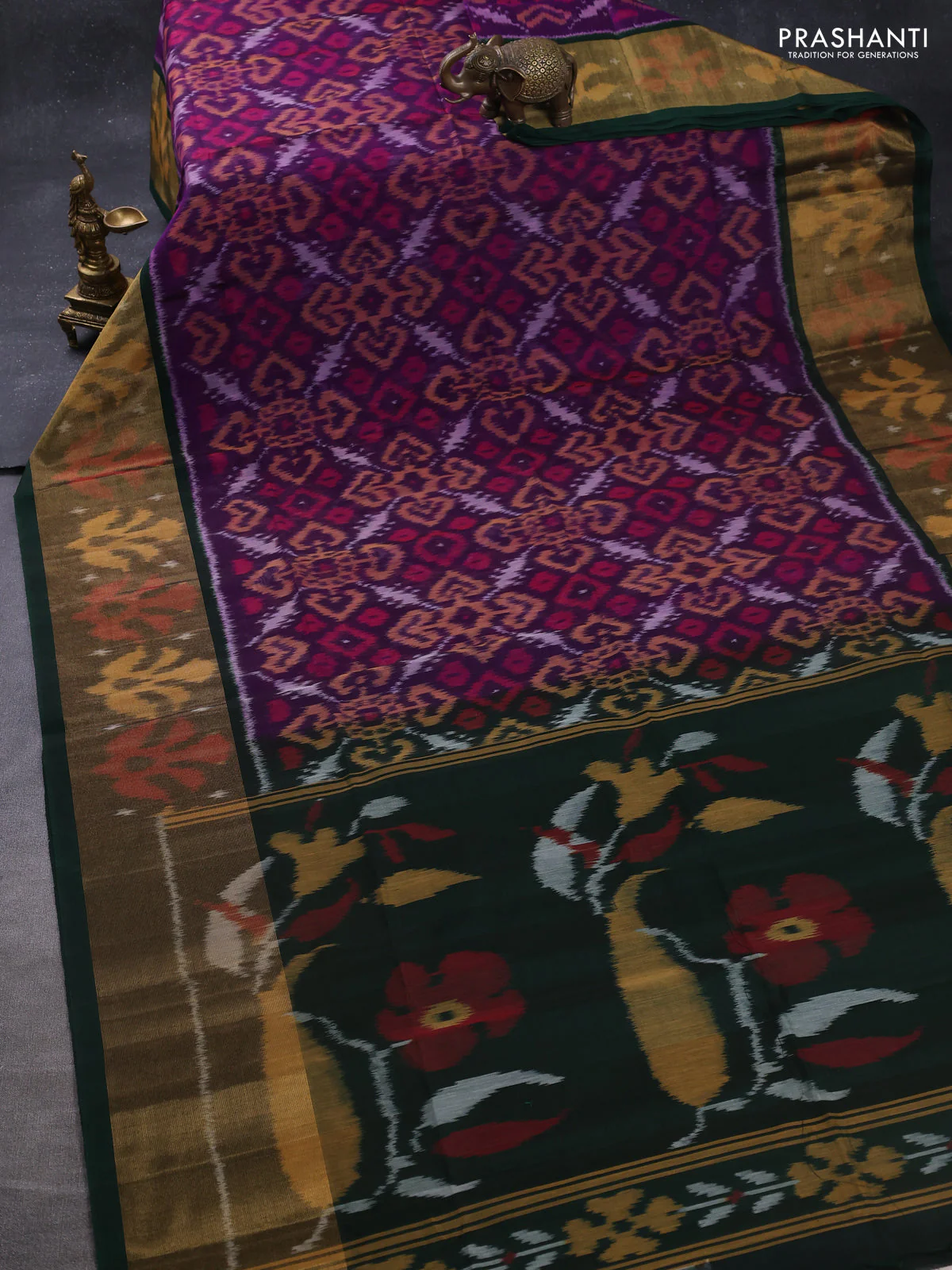Ikat silk cotton saree purple and bottle green with allover ikat weaves and long zari woven ikat border - Image 2