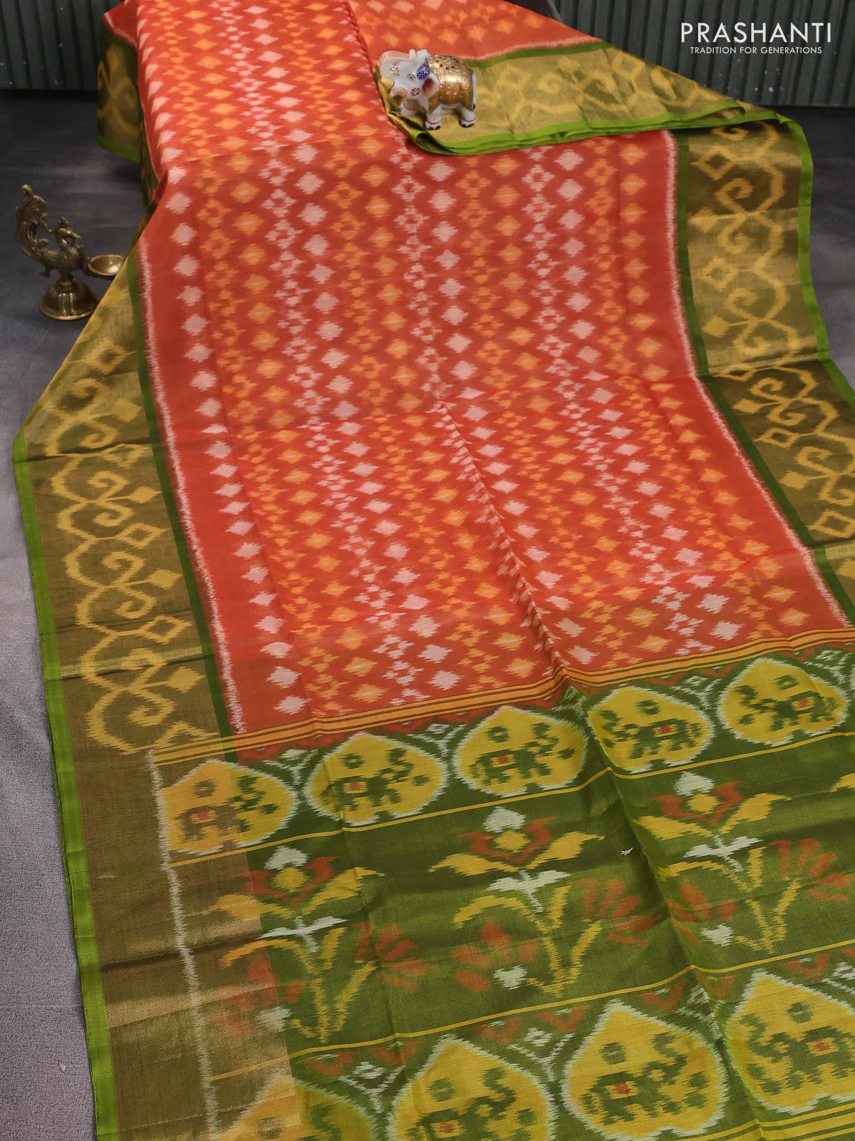 Ikat silk cotton saree rustic orange and light green with alover ikat weaves and long zari woven ikat border - Image 2