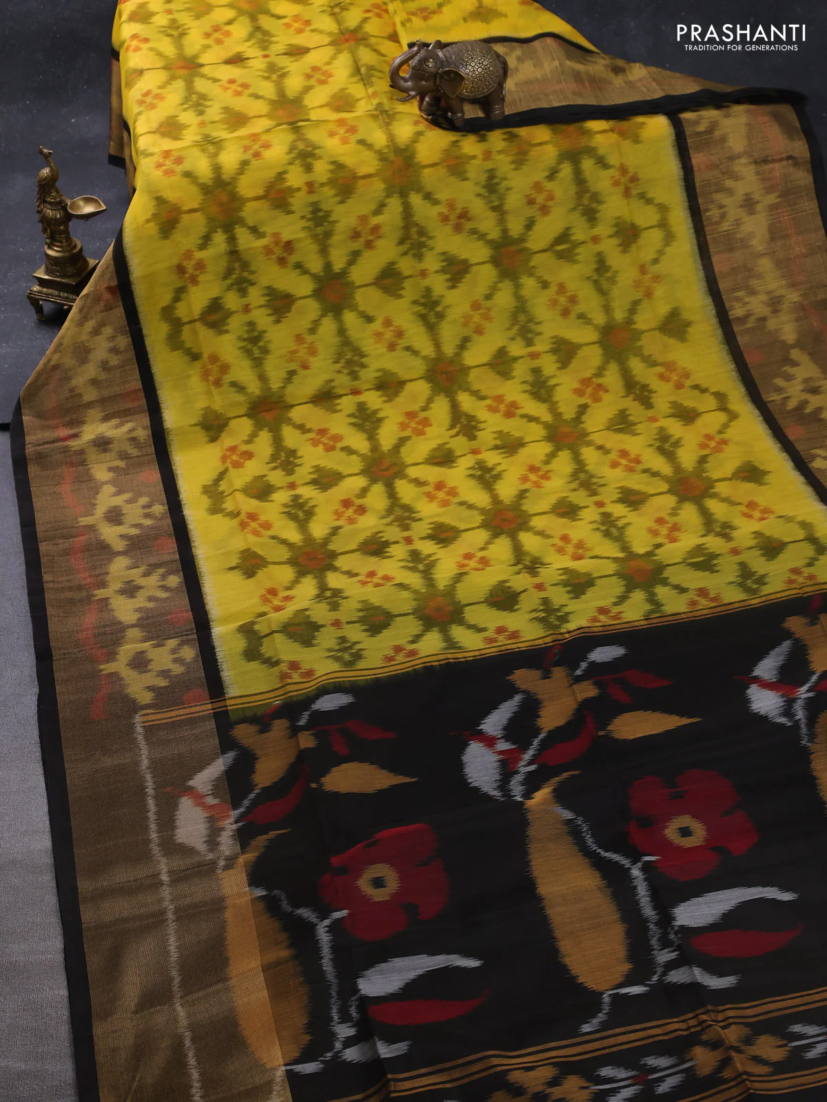 Ikat silk cotton saree yellow and black with allover ikat weaves and long zari woven ikat border - Image 2