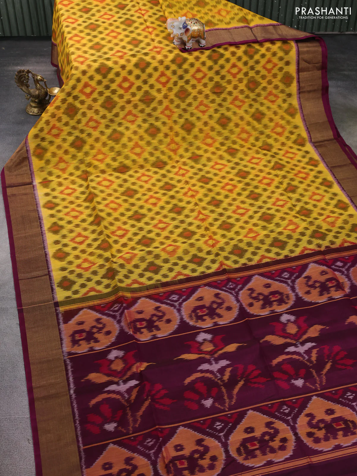 Ikat silk cotton saree yellow and dark magenta pink with allover ikat weaves and zari woven border - Image 2