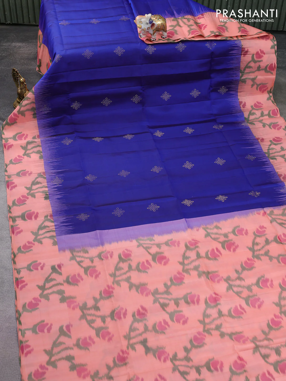 Ikat soft silk saree blue and peach orange with zari woven buttas and ikat style border - Image 2