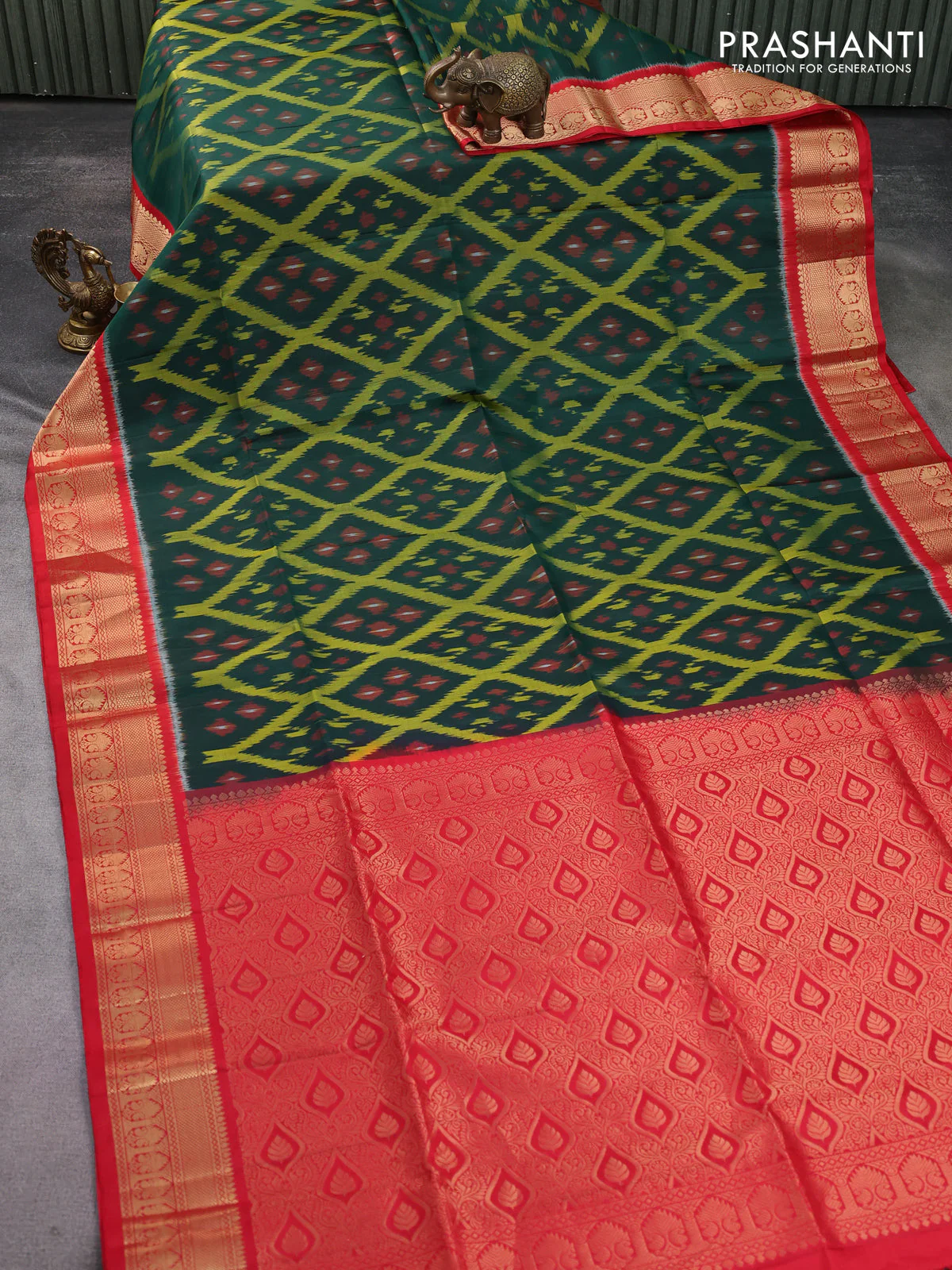 Ikat soft silk saree dark green and red with allover ikat weaves and zari woven border - Image 2