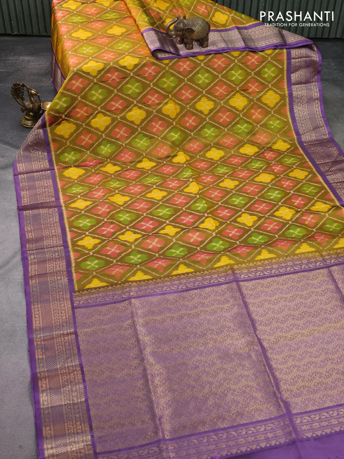 Ikat soft silk saree dark mustard and lavender shade with allover ikat weaves and zari woven border - Image 2