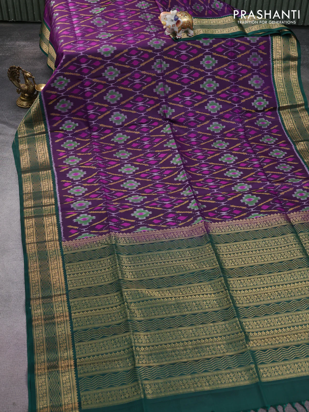 Ikat soft silk saree deep purple and green with allover ikat weaves and zari woven border - Image 2