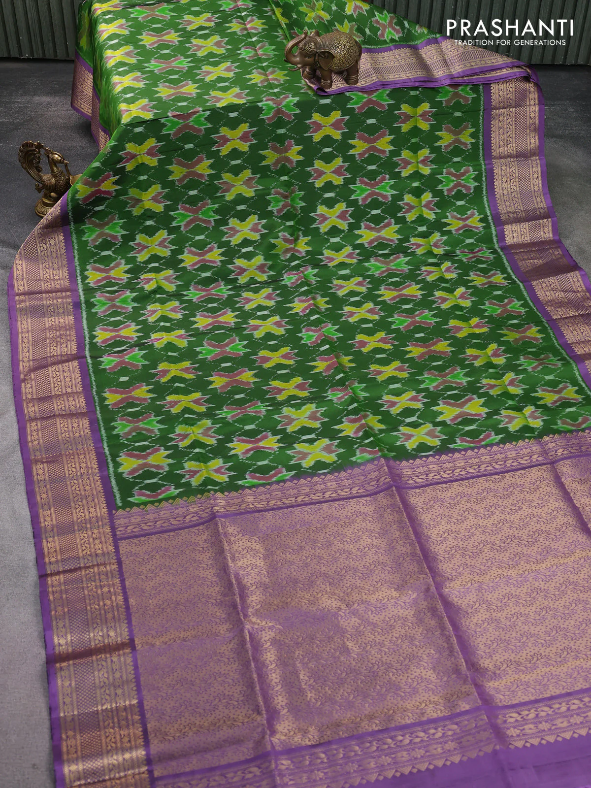 Ikat soft silk saree green and pastel lavender with allover ikat weaves and zari woven border - Image 2