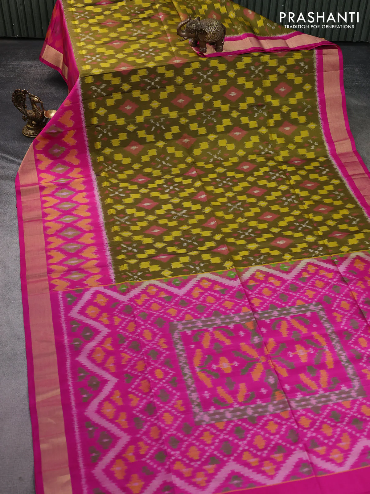 Ikat soft silk saree mehendi green and pink with allover ikat weaves and ikat style zari border - Image 2