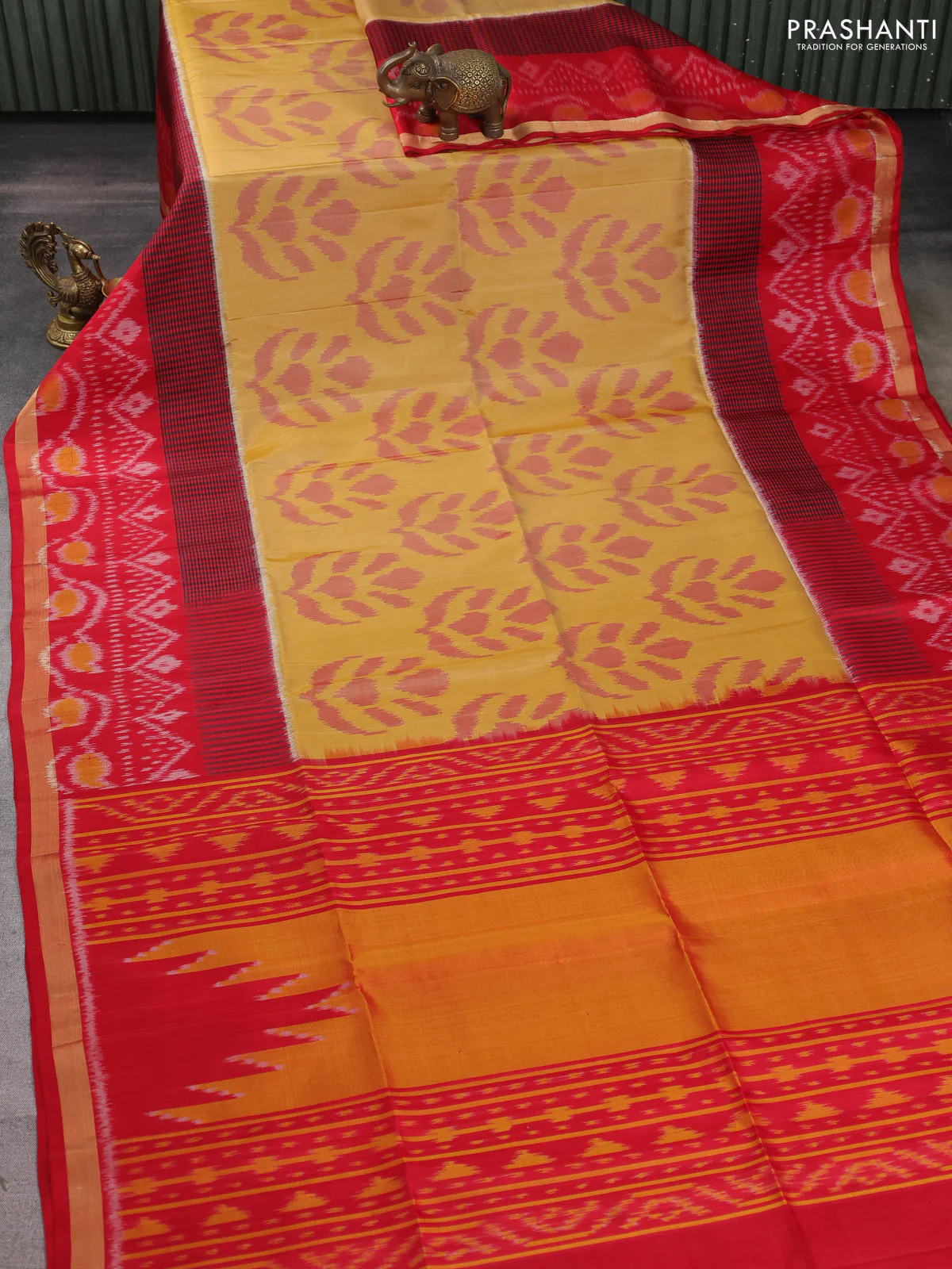 Ikat soft silk saree mustard yellow and red with allover ikat butta weaves and long ikat woven zari border - Image 2