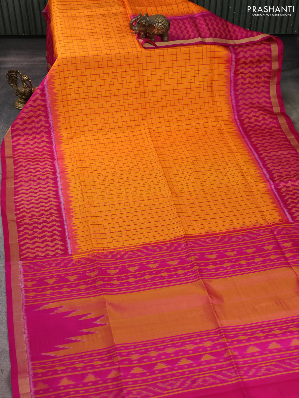 Ikat soft silk saree orange and pink with allover checks & ikat weaves and long ikat woven zari border - Image 2