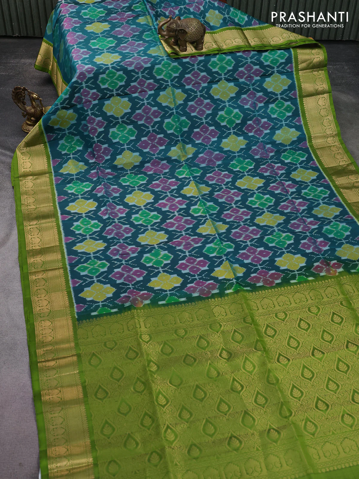 Ikat soft silk saree peacock green and light green with allover ikat weaves and zari woven border - Image 2