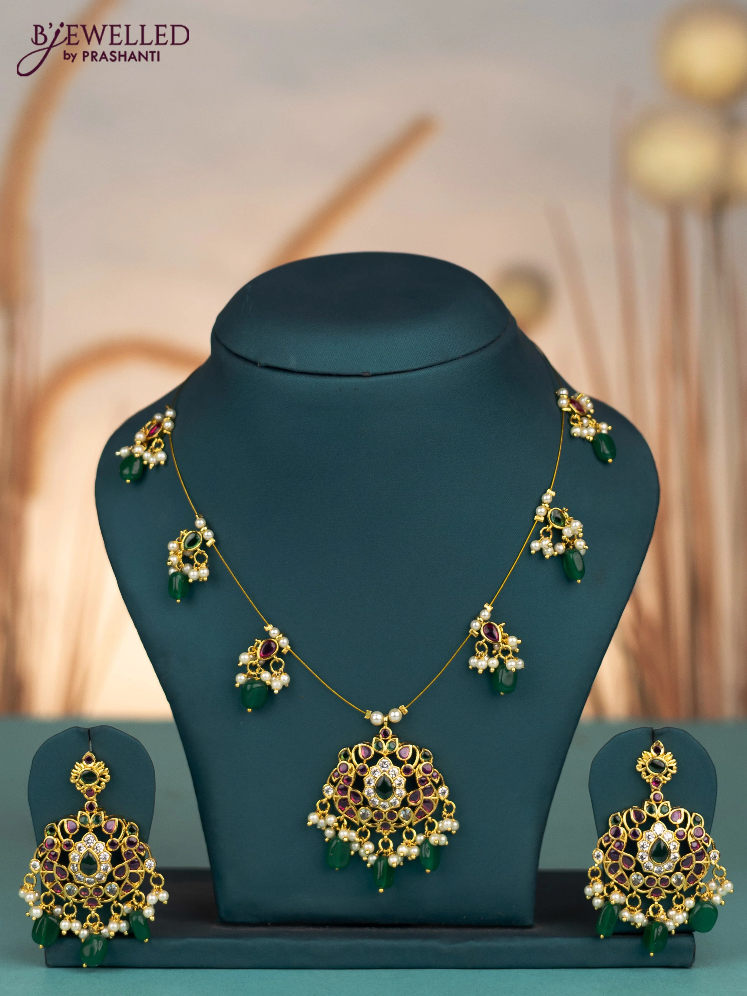 Invisible chain with kemp & cz stones and pearl & green beads hangings