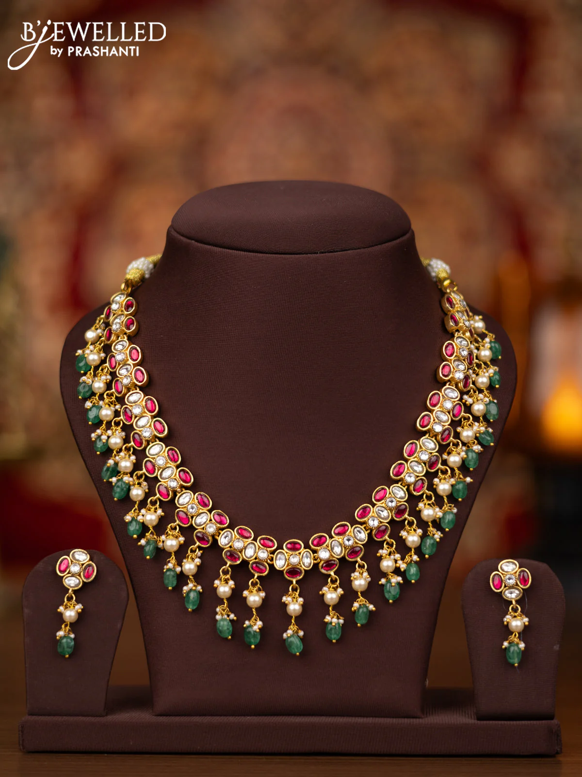 Jadau necklace with pink jadau kundan stones and pearl & beads hangings