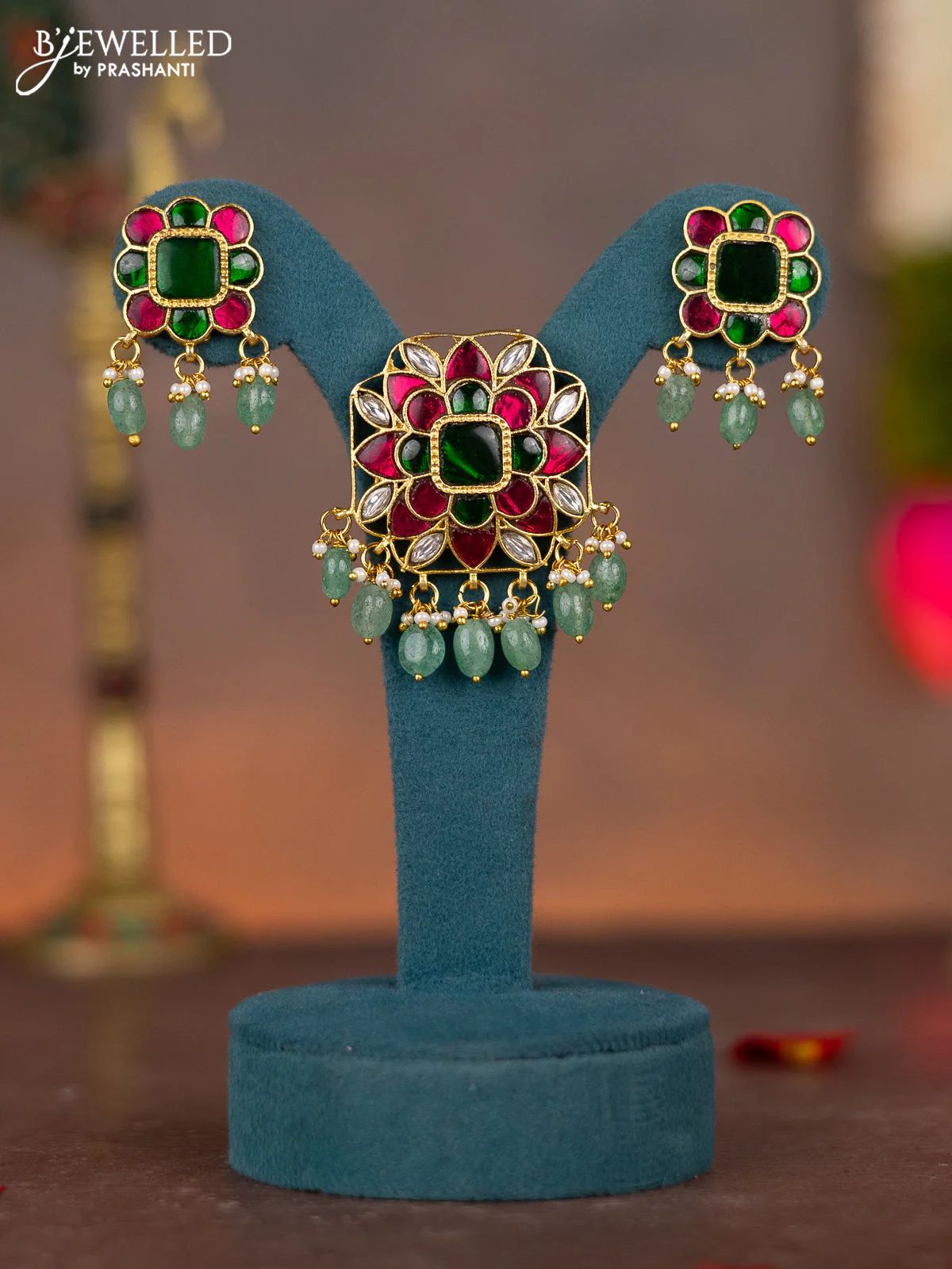 Jadau pendant set floral design with jadau kundan stones and pearl & green beads hanging