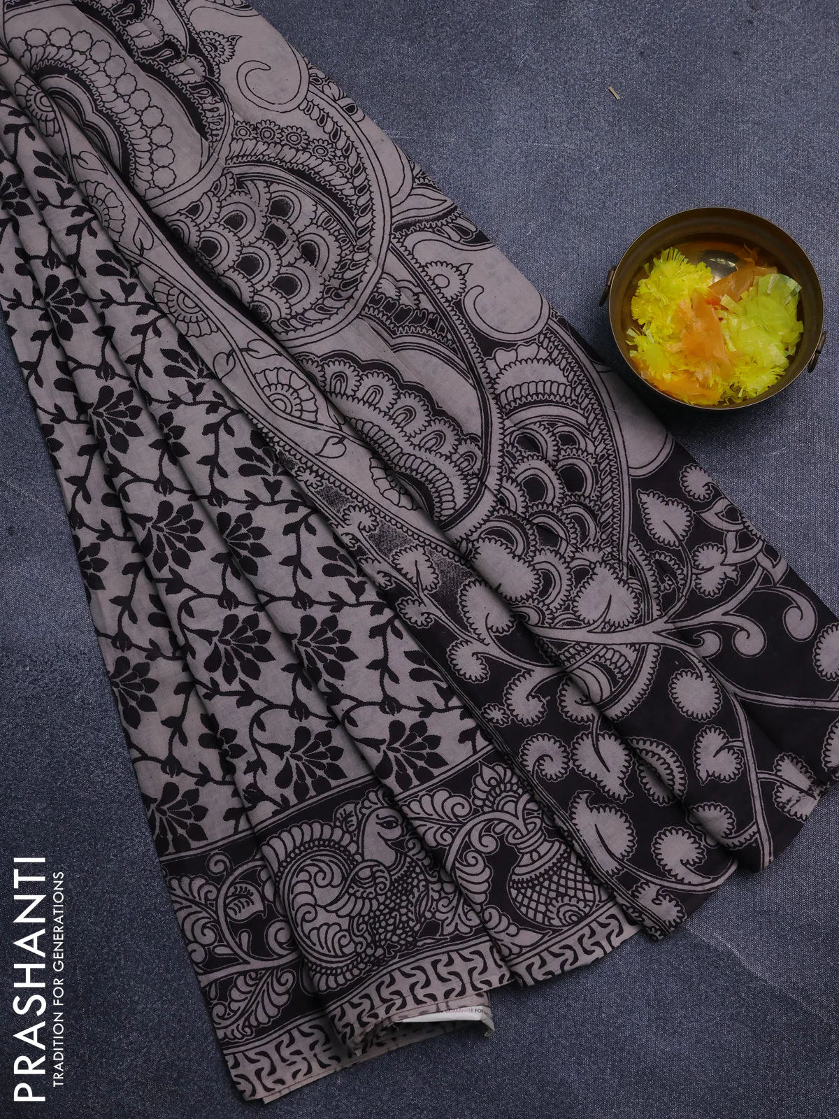 Kalamkari cotton saree black with allover floral prints and printed border