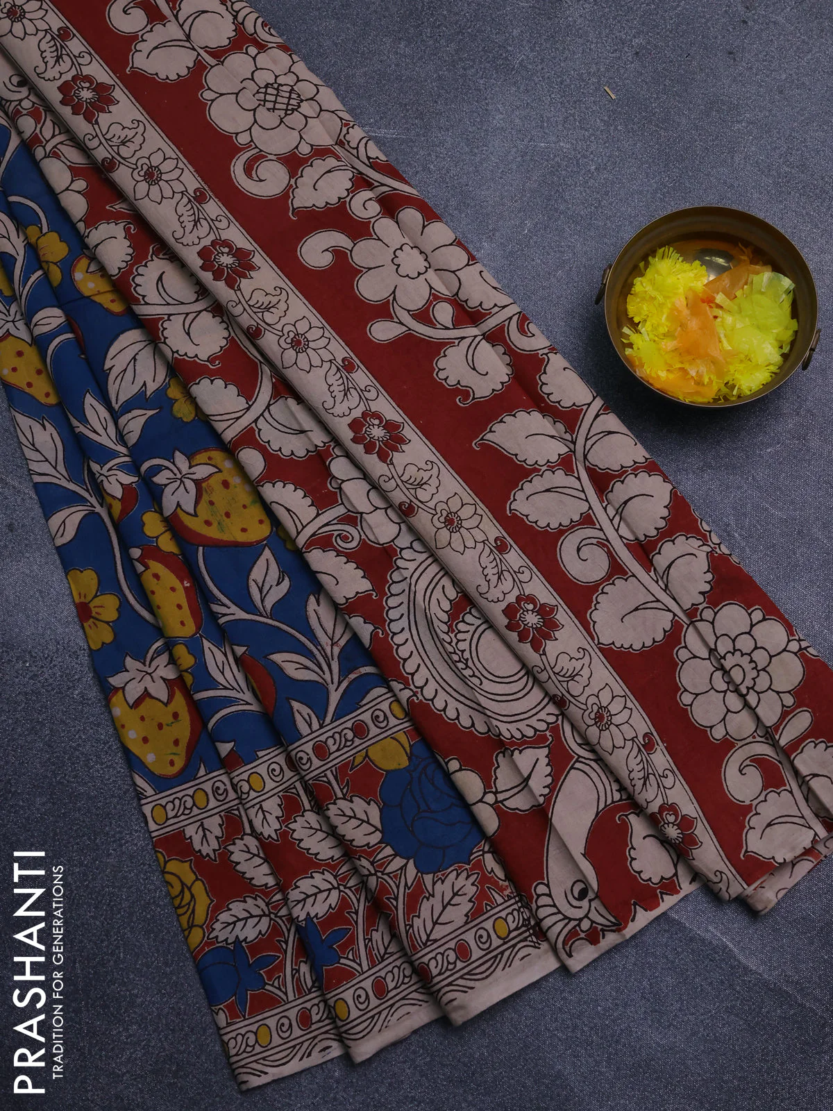 Kalamkari cotton saree blue and rust shade with allover prints and printed border