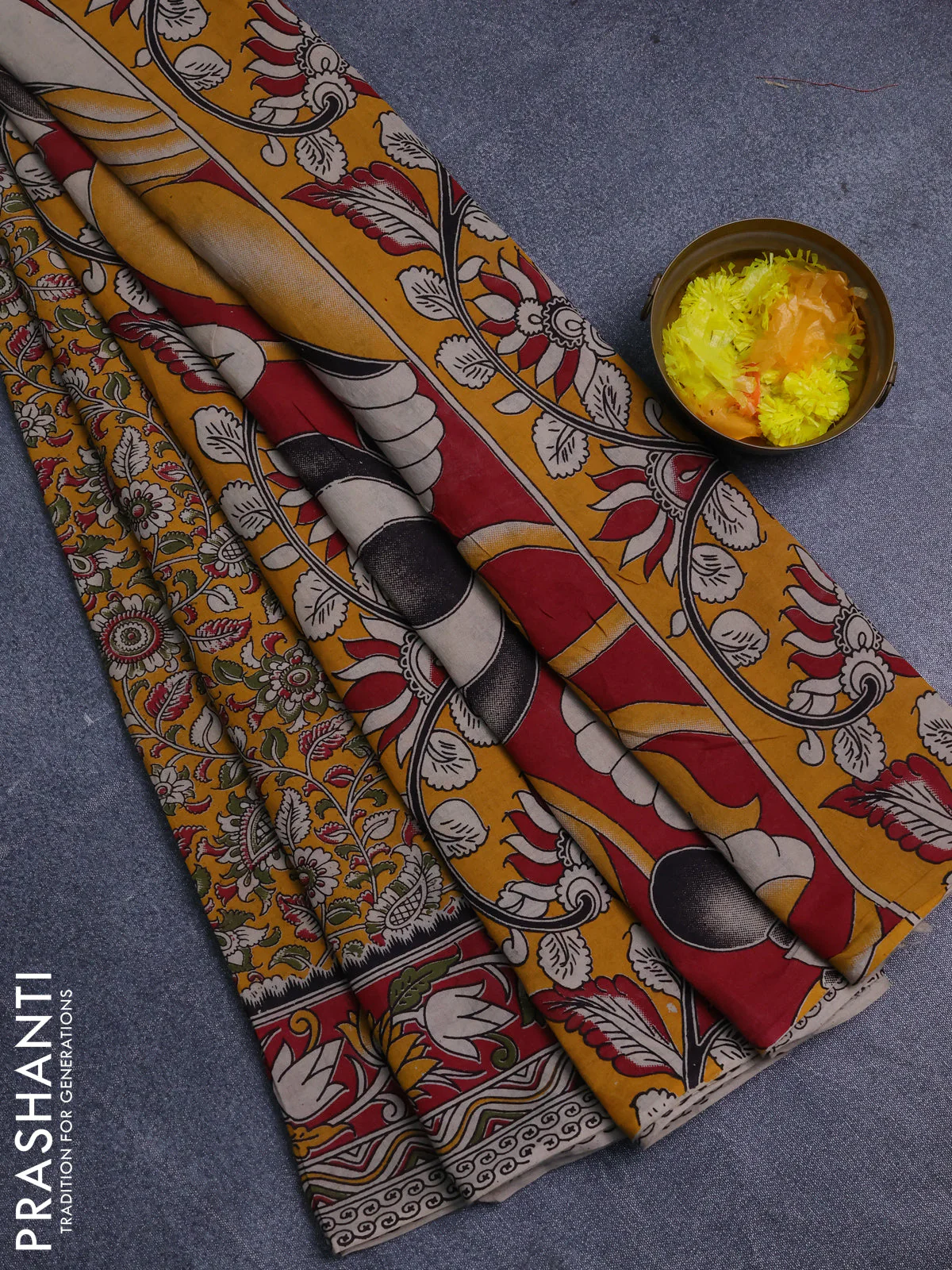 Kalamkari cotton saree yellow and maroon with allover prints and printed border
