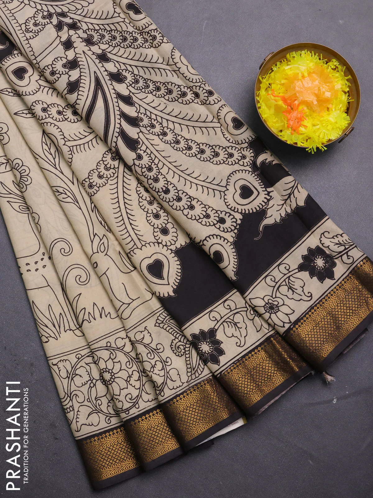 Kalamkari semi silk saree beige and black with allover prints and mangalgiri border