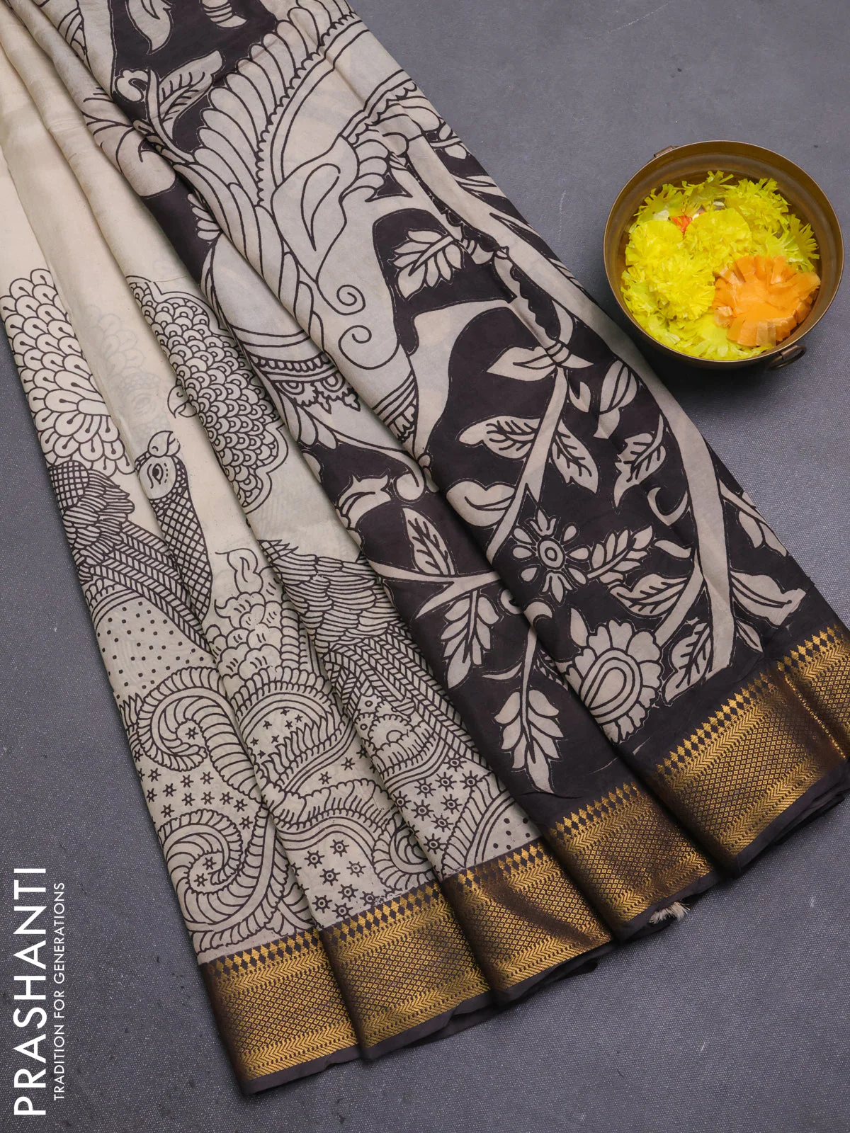 Kalamkari semi silk saree beige and brown with allover prints and mangalgiri border