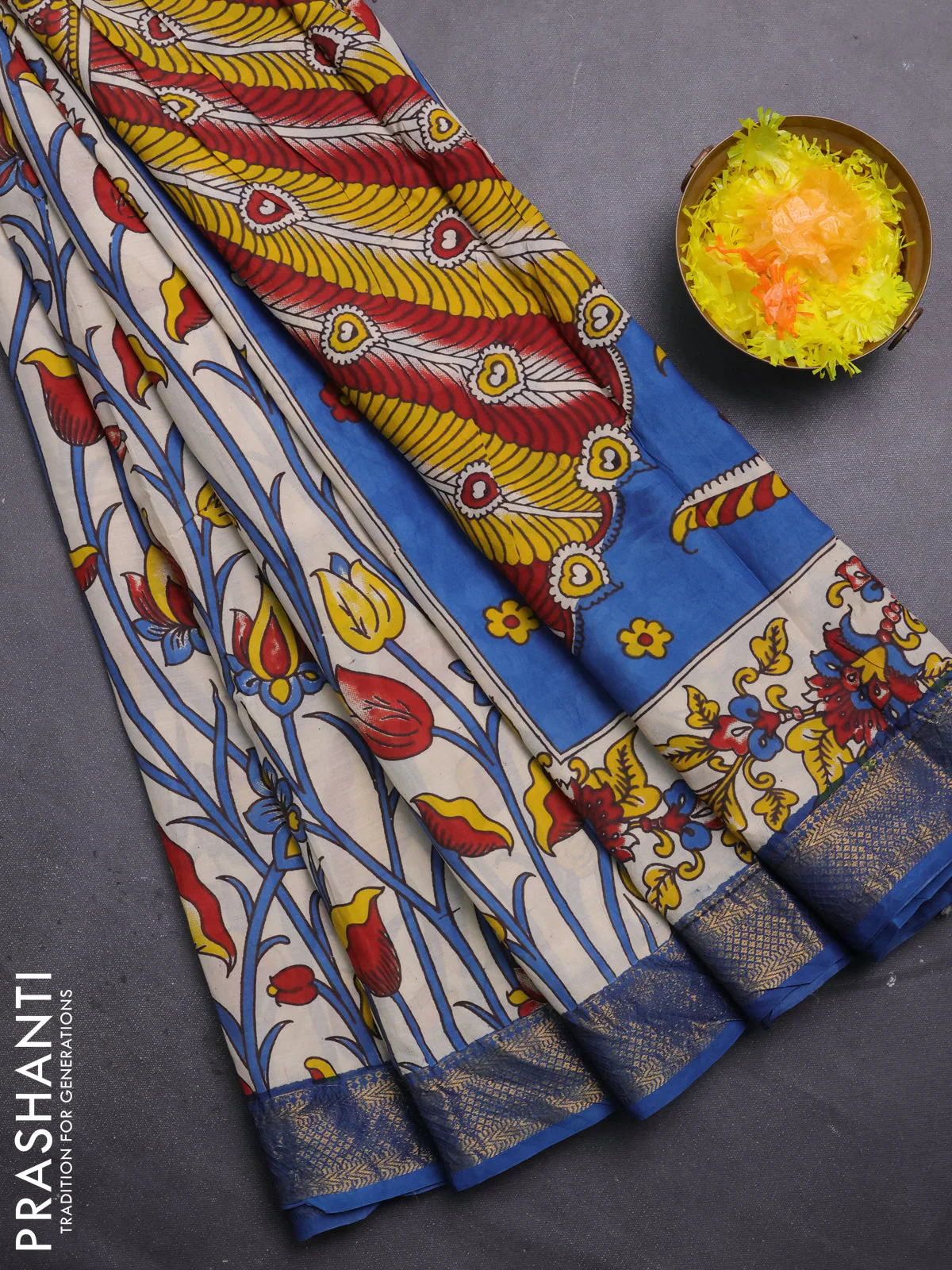 Kalamkari semi silk saree beige and peacock blue with allover prints and mangalgiri border