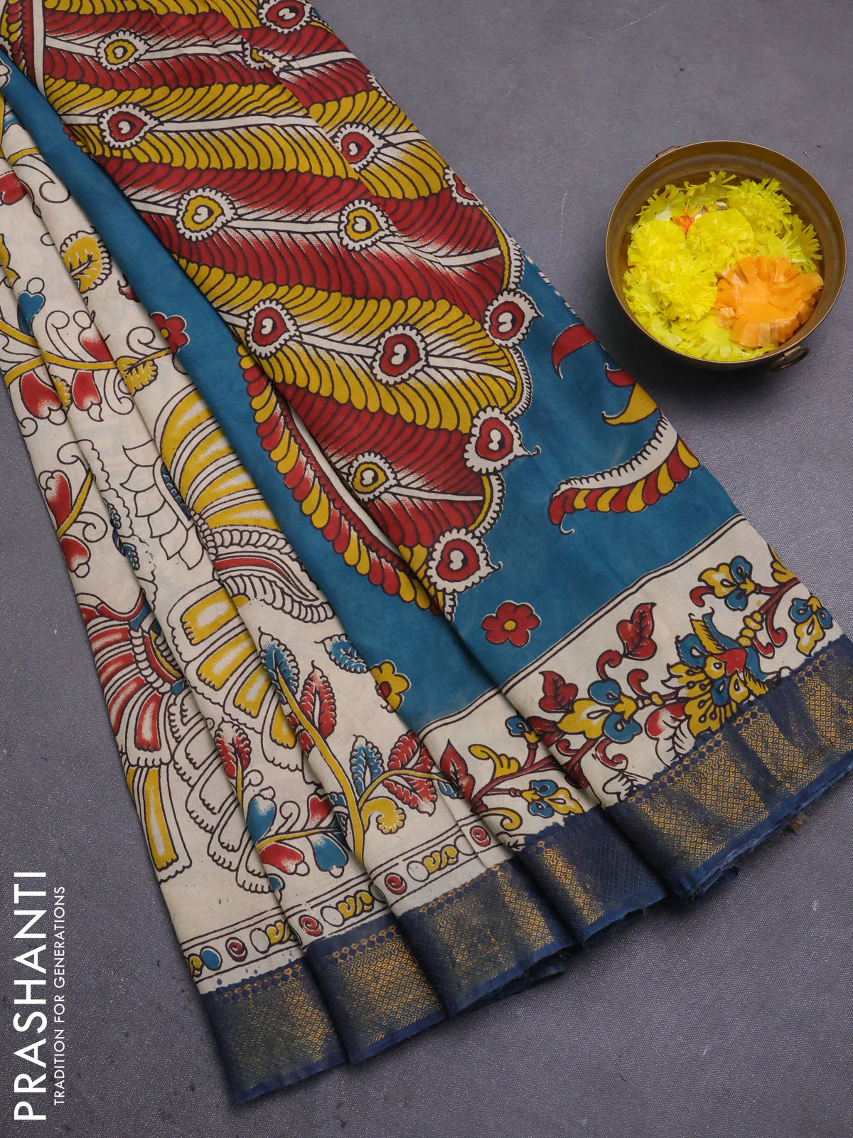 Kalamkari semi silk saree beige and peacock blue with allover prints and mangalgiri border