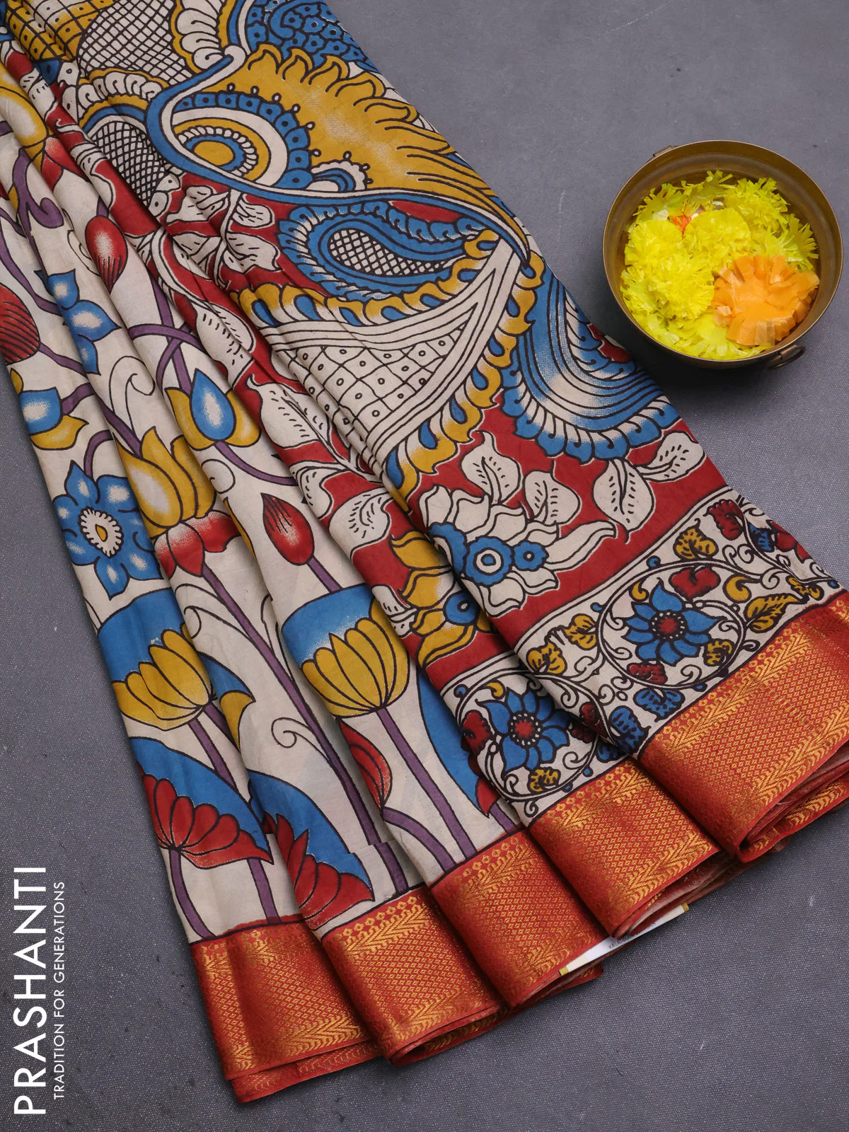 Kalamkari semi silk saree beige and rust shade with allover prints and mangalgiri border