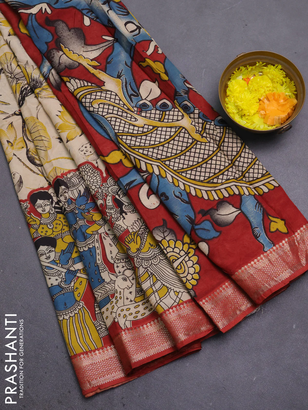 Kalamkari semi silk saree beige and rust shade with allover prints and mangalgiri border