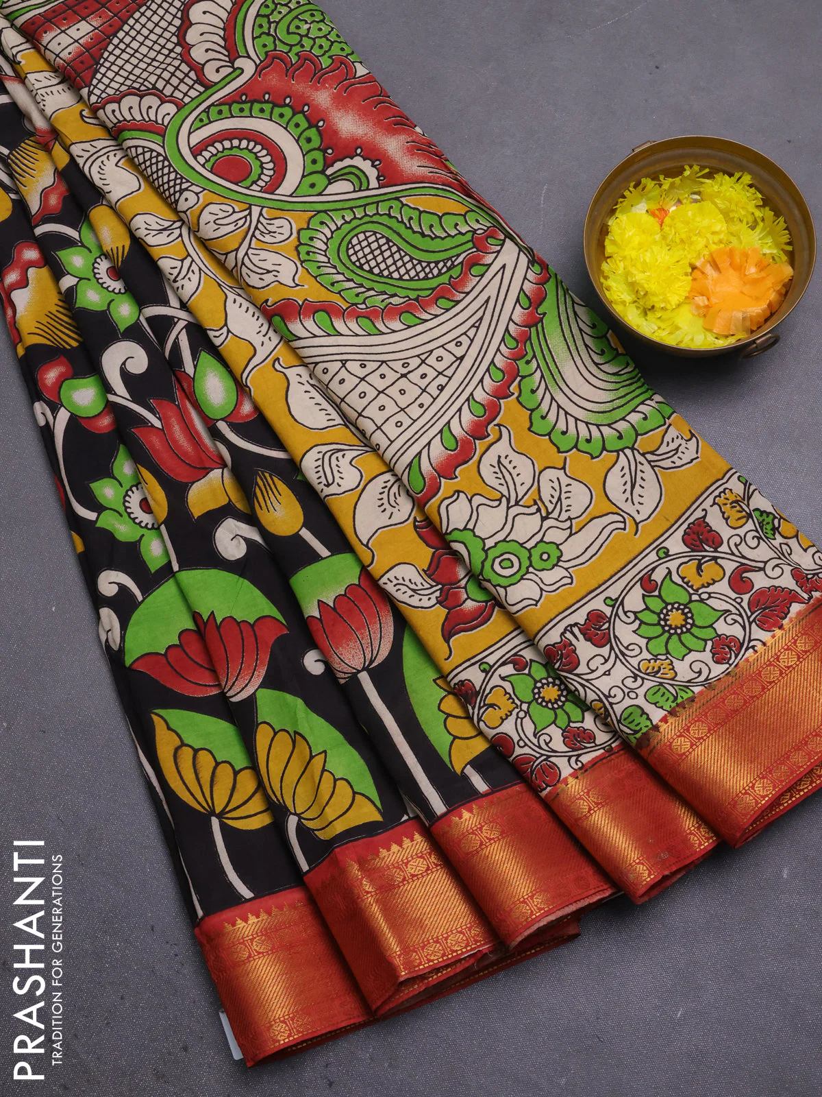 Kalamkari semi silk saree black and rust shade with allover prints and mangalgiri border