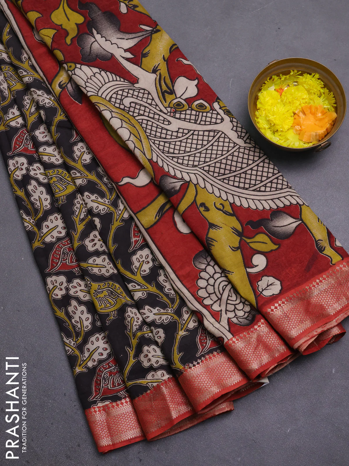 Kalamkari semi silk saree black and rust shade with allover prints and mangalgiri border