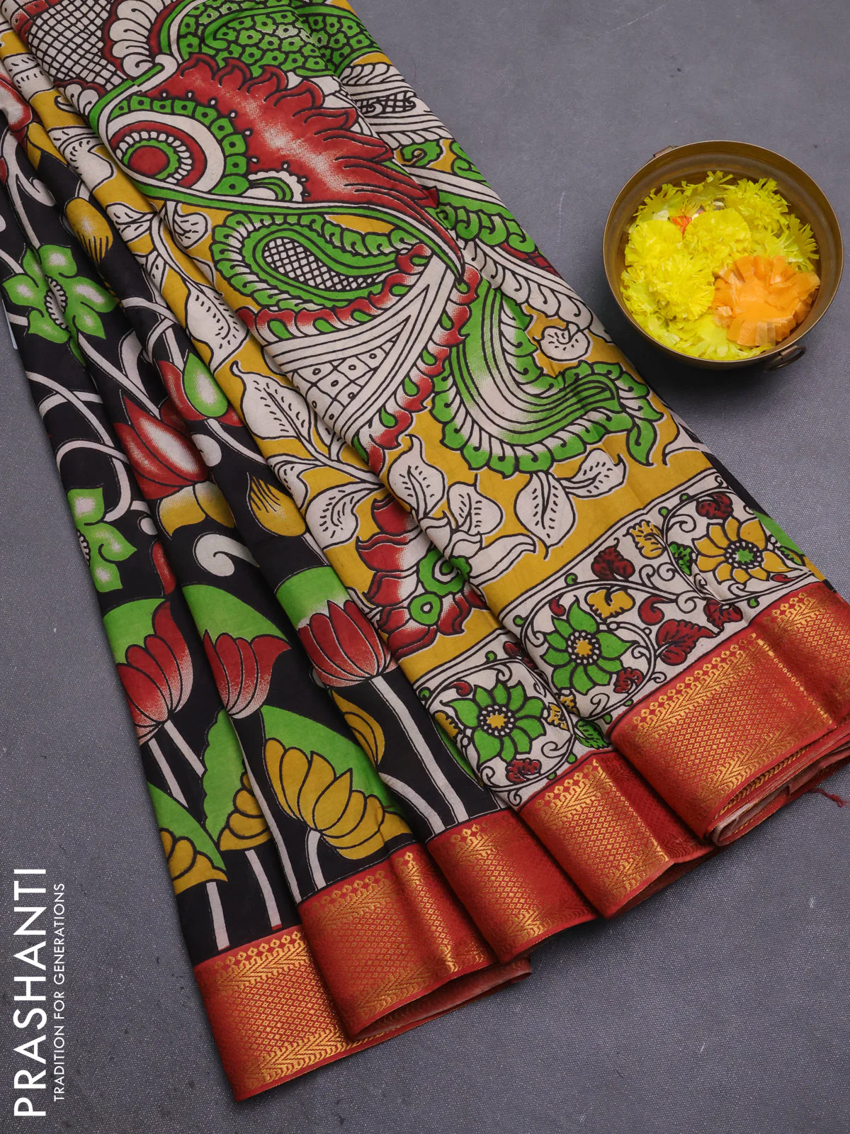 Kalamkari semi silk saree black and rust shade with allover prints and mangalgiri border