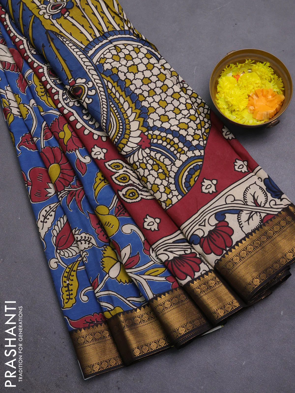 Kalamkari semi silk saree blue and black with allover prints and mangalgiri border