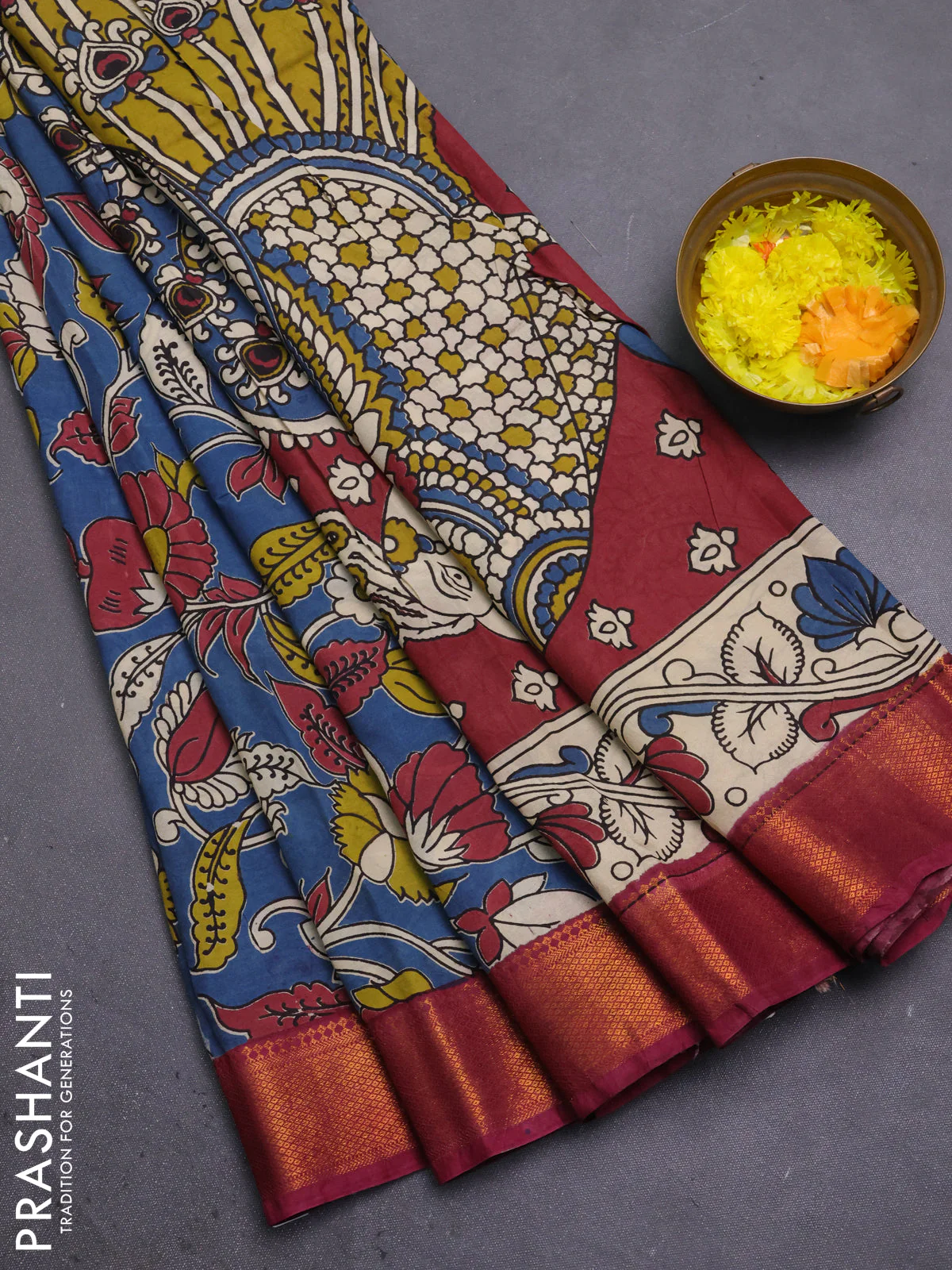 Kalamkari semi silk saree blue and dark magenta with allover prints and mangalgiri border