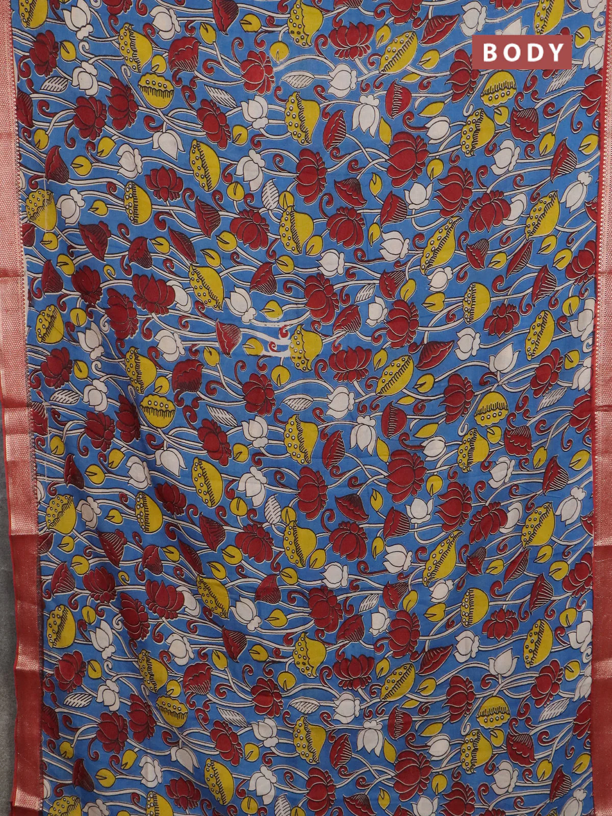 Kalamkari semi silk saree blue and rust shade with allover prints and mangalgiri border - Image 2