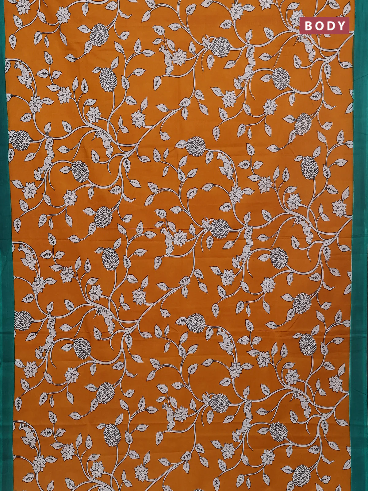 Kalamkari semi silk saree dark mustard and teal green with allover prints and simple border - Image 2